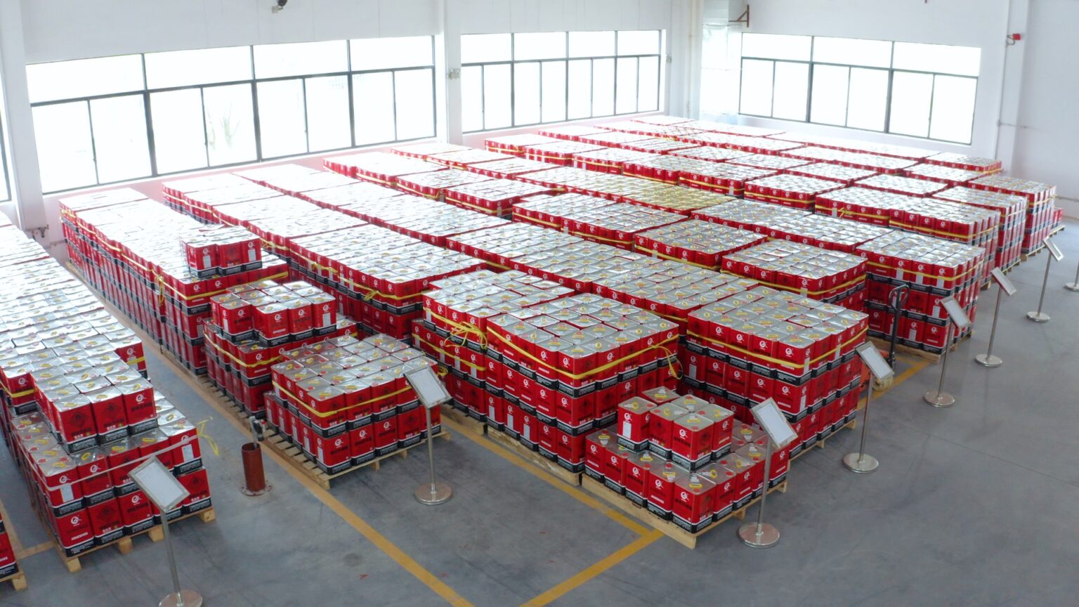 heley warehouse full of adhesive tins