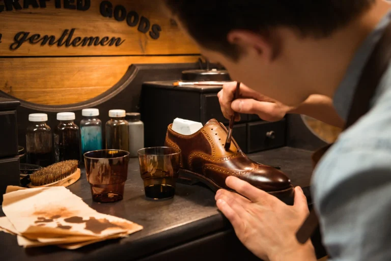side-view-image-young-concentrated-shoemaker