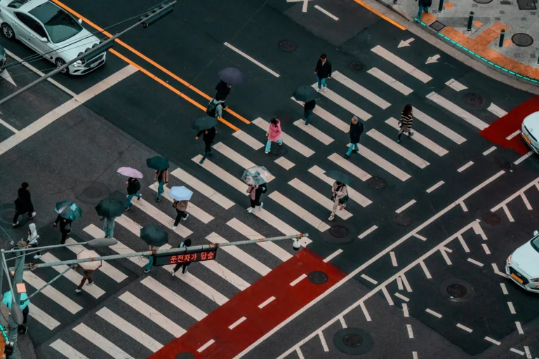The hurried pedestrians on the zebra crossing