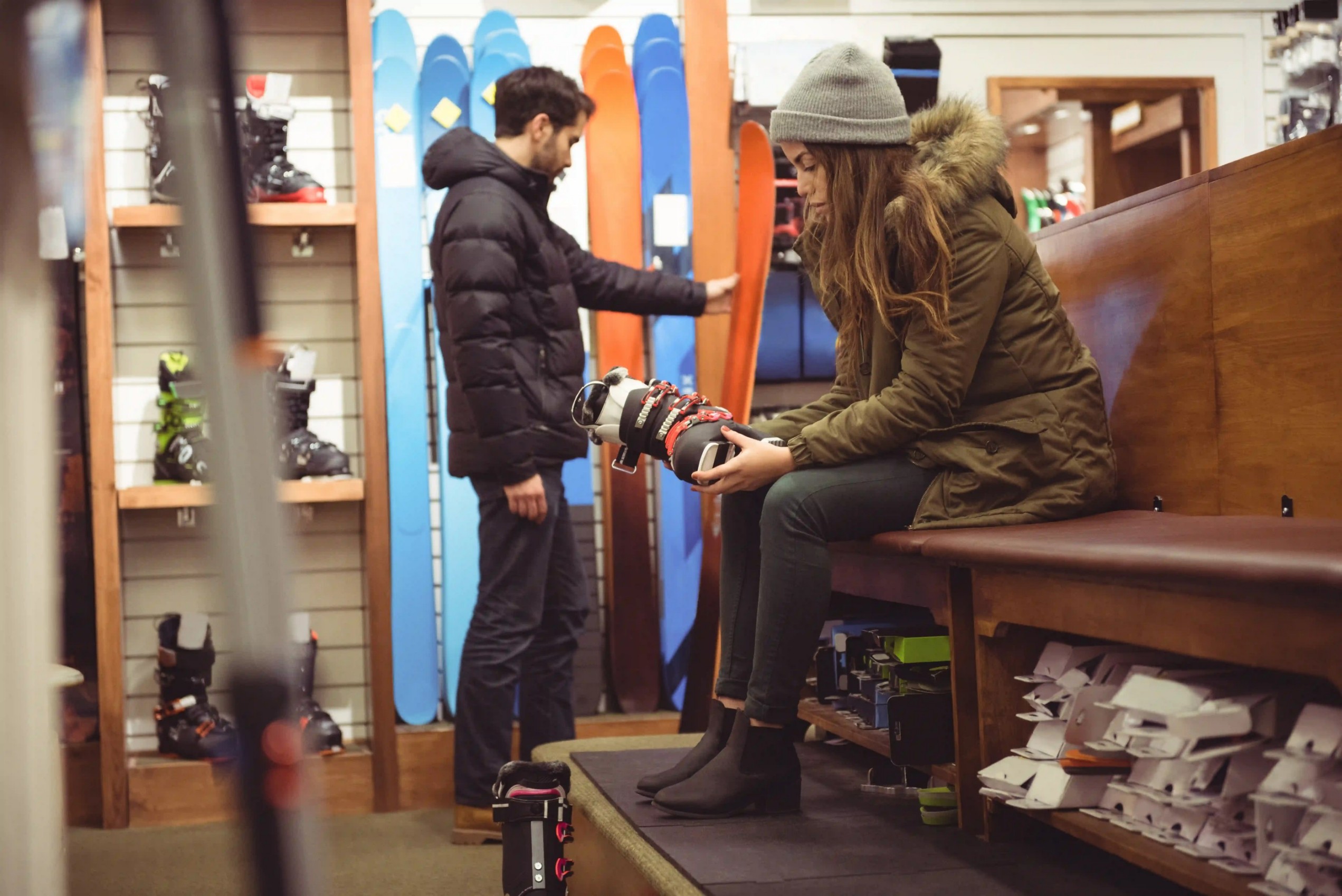 woman-selecting-ski-boot-shop